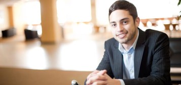seated-student-in-suit